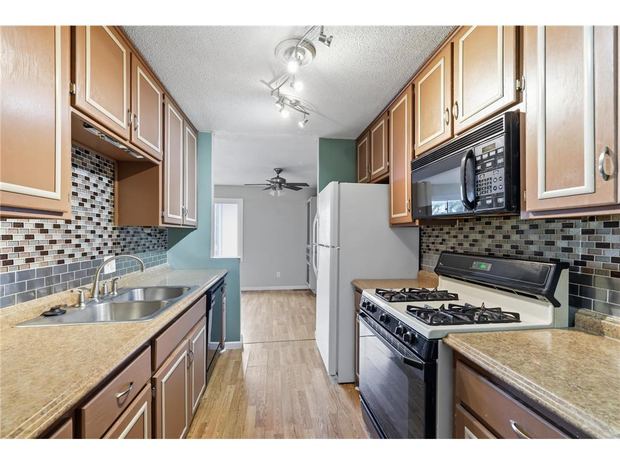 Kitchen with gas range and full appliance package