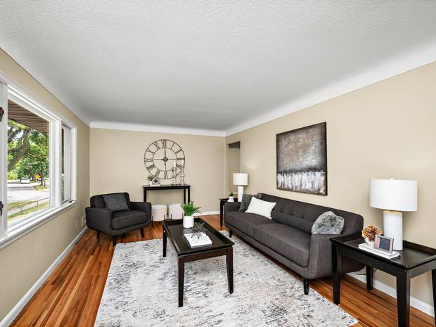 Living room with the restored hardwood floors