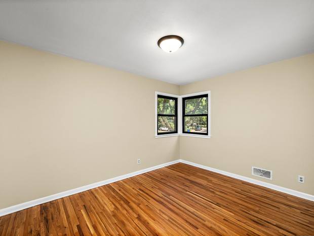Bedroom with hardwood floors