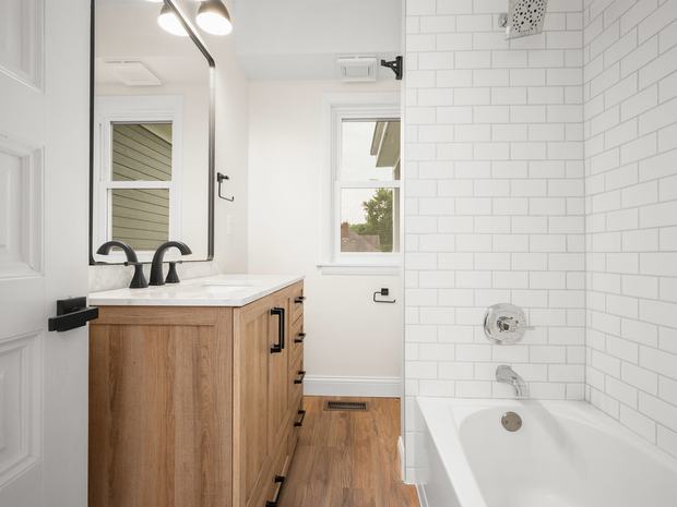 Full bathroom with subway tile
