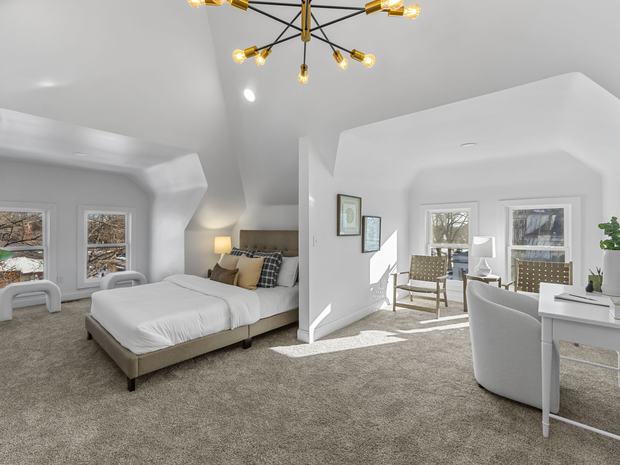 Primary suite on its own level, with a sitting area