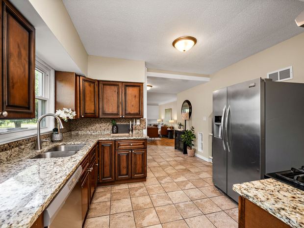 Kitchen with granite and stainless