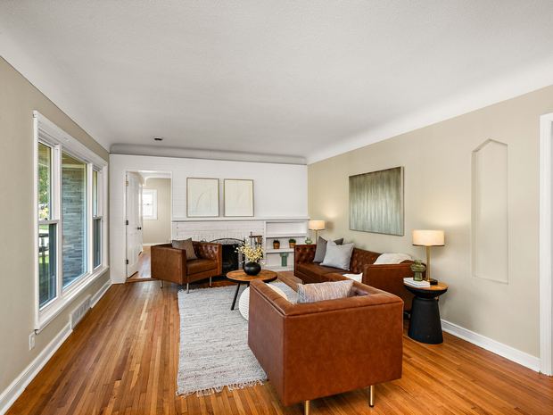 Living room from the entry, windows along the front
