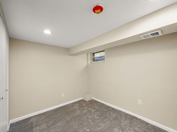Carpeted room on the lower level