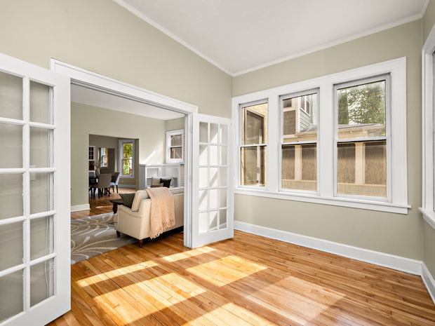 French doors between the sun porch and the living room