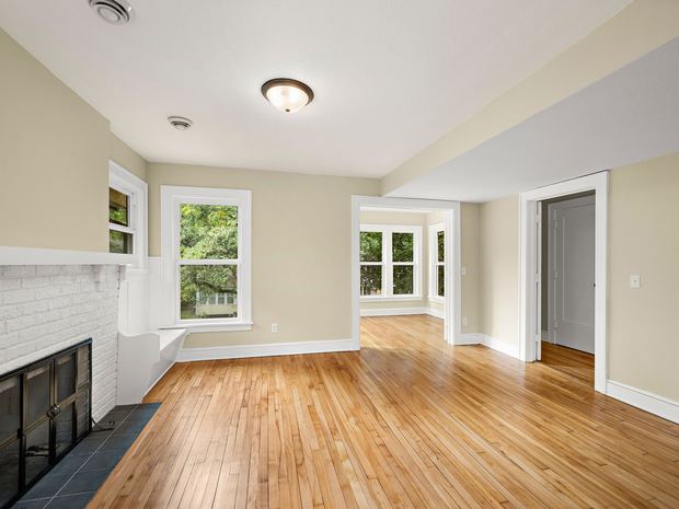 Upper unit fireplace from across the room