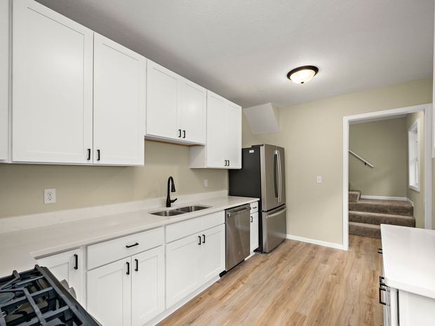 Upper unit kitchen with the gas range