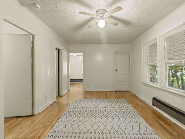Living room with refinished hardwood