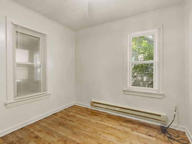 Bedroom with hardwood floors