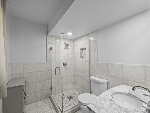 Lower level bathroom with a glass shower