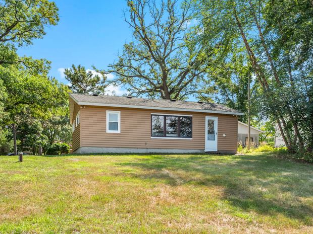 The home from the lake side of the lot