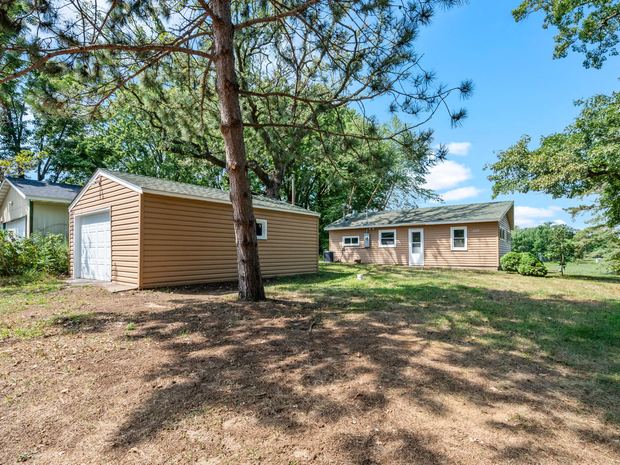 The storage shed and the open yard