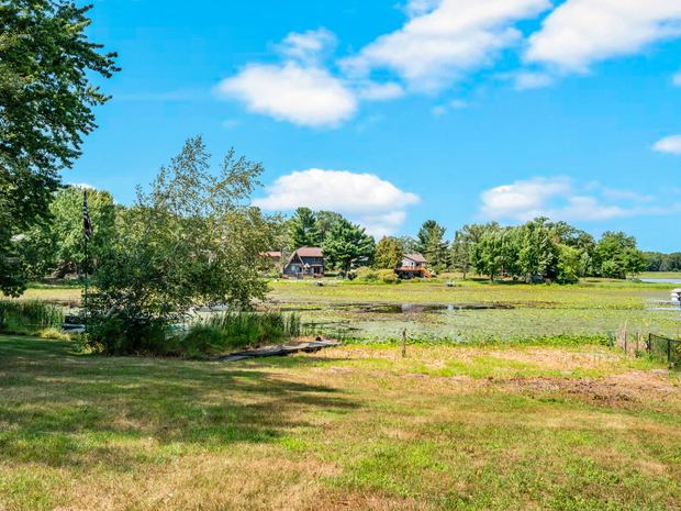 The yard running down to the water