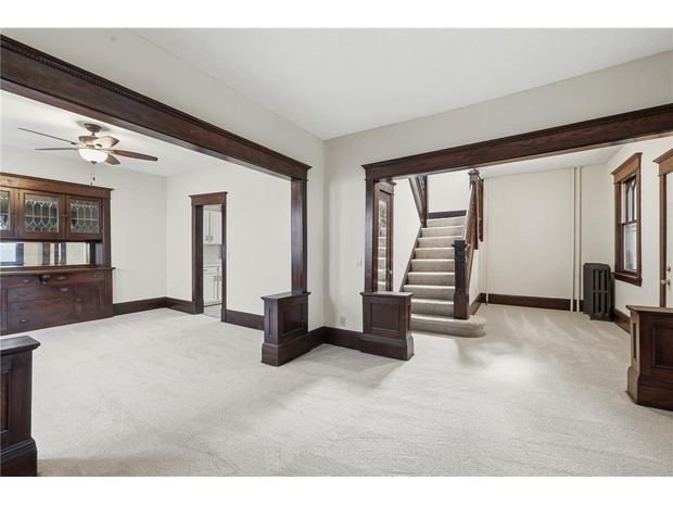 Living room with the original woodwork and staircase